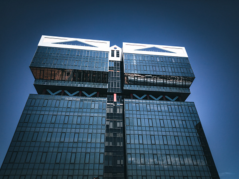 Images with abstract background of the reflection effect of the facade of a building by its shape