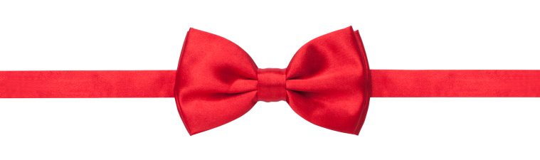A red bow tie isolated on a white background