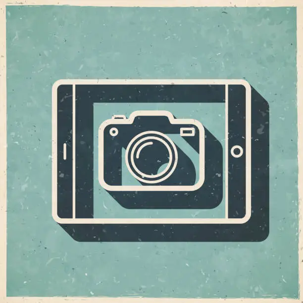 Vector illustration of Tablet PC with camera. Icon in retro vintage style - Old textured paper