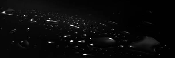 Realistic 3D water drops on black surface Realistic 3D water drops on black surface. Vector illustration of rain droplets, morning dew, aqua spray spots sprinkled on car hood or glass backdrop. Wet texture, light reflection in liquid blobs water on black surface stock illustrations