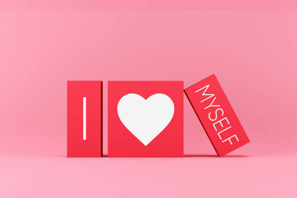 istock Self esteem and appreciation concept. I love myself message on pink blocks. 1582574717