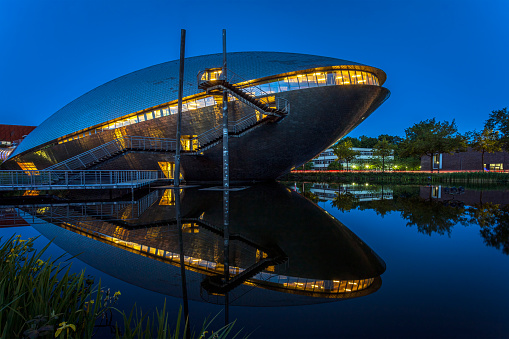 The Universum Science Center Museum building seen at the blue hour. Photo was taken on the 3rd of June 2023 in Bremen or the German state free Hanseatic city of Bremen, Germany.