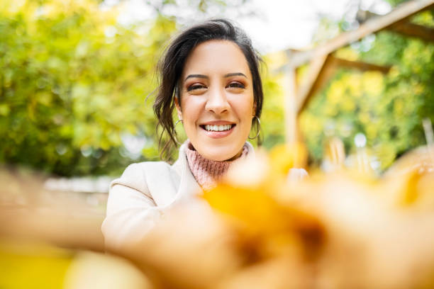 istock Happy Woman's Spirited Autumn Celebration 1582588729