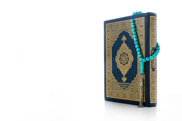 istock The Holy Al Quran with written Arabic calligraphy 1582591452