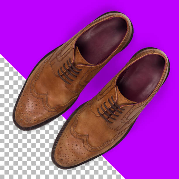istock Top up view isolated leather brown men shoes 1582594734