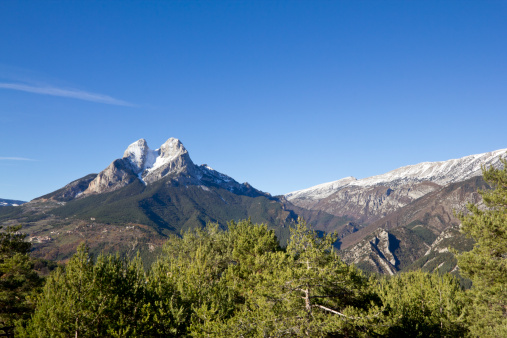 El Pedraforca and Cadi mountain range with snow in winter. El pedraforca is a Catalonian mythic and magic mountain - pyrenee zone - (Spain)