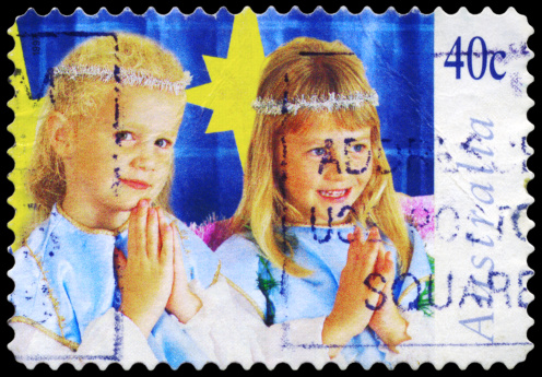 A Stamp printed in AUSTRALIA shows the Children in Christmas Nativity pageant, \