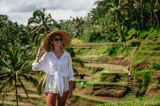 Woman enjoying Bali rice fields