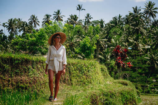 Woman enjoying Bali rice fields