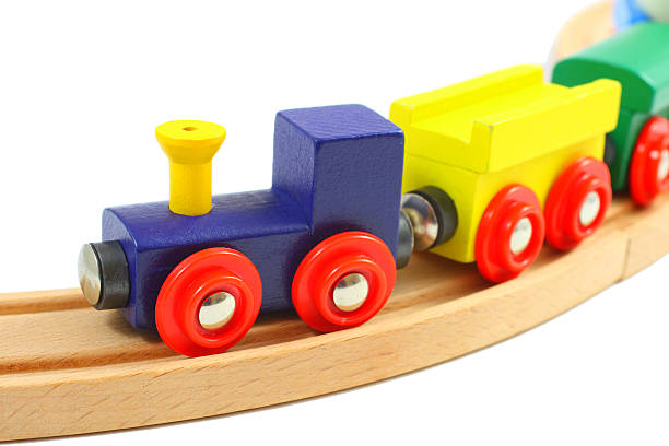 istock Wooden train toy on rails isolated over white 158264301