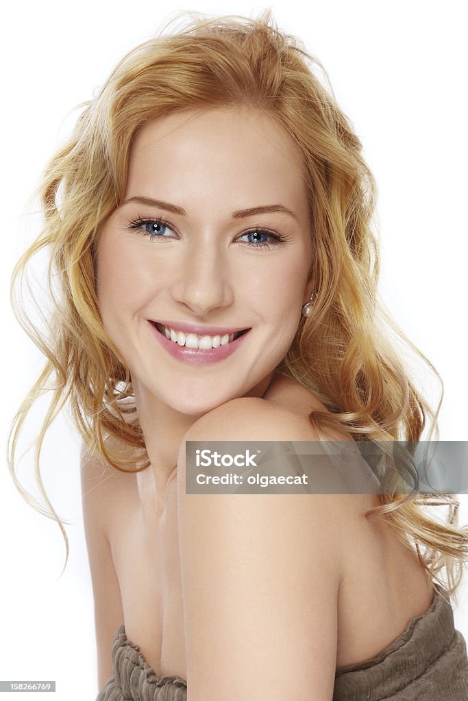 Laughing girl Portrait of young beautiful happy laughing woman with long curly hair, on white background Adult Stock Photo