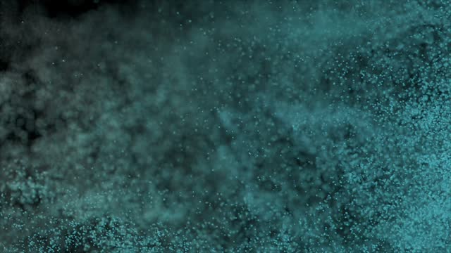 Blue sand cover blown off on a black isolated background. Airflow. Grains of sand. Slow motion. 3d animation