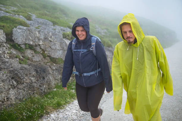 istock Happy travelers exploring the nearby mountain pass 1582689272