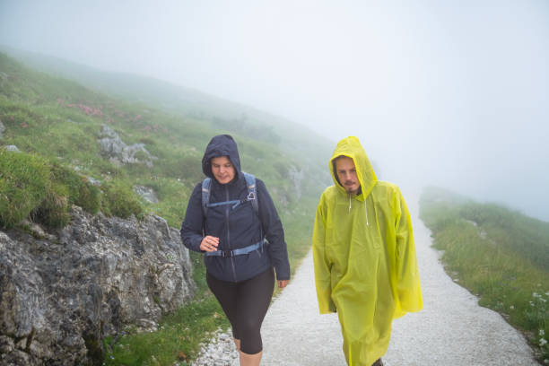 istock Happy travelers exploring the nearby mountain pass 1582689276