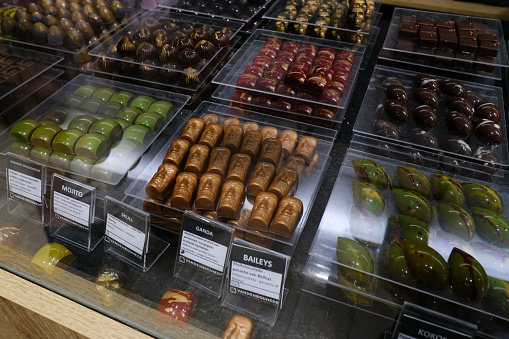 Belgian chocolates for sale in pastry shop in historical city center of Ghent, Belgium on July 29, 2023.