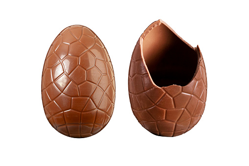 Chocolate Easter egg whole and broken isolated on a white background