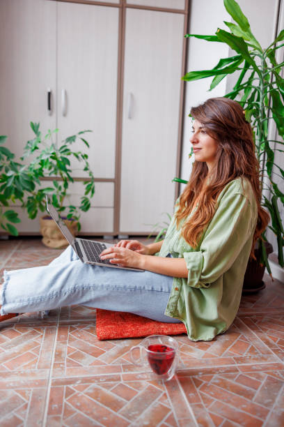 istock Woman telecommuting 1582713744