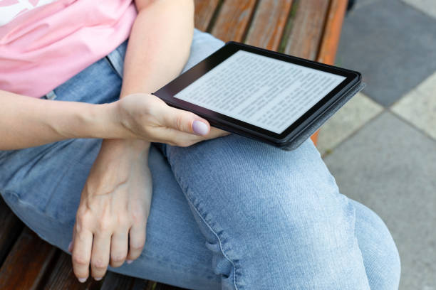istock Moscow, Russia - July 04, 2023: woman reading e-book. 1582742763