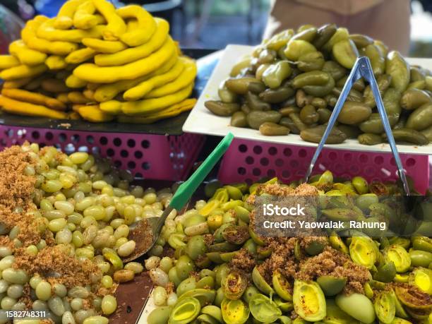 Pickled Olives On The Street Market In Bangkok Thailand Stock Photo - Download Image Now