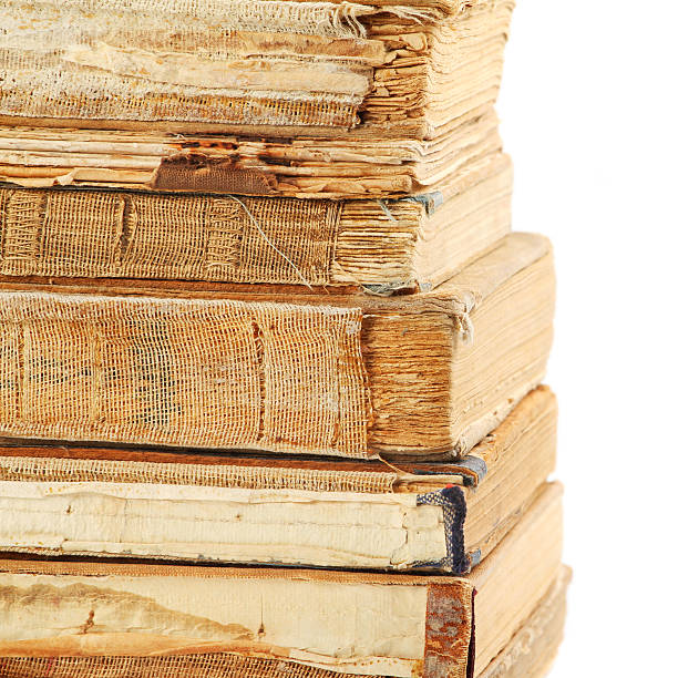 istock Stack of old books tied with rope isolated on white 158276916