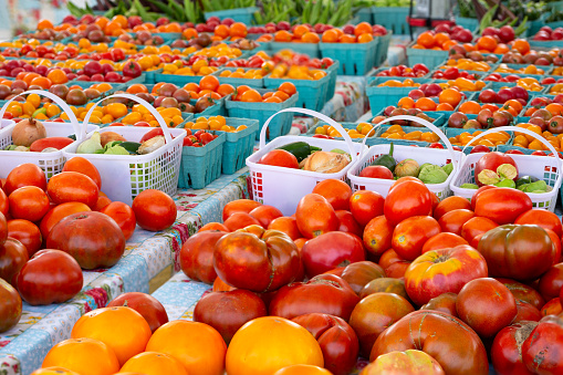 Multi-colored and various types of tomatoes at an outdoor market in Virginia USA