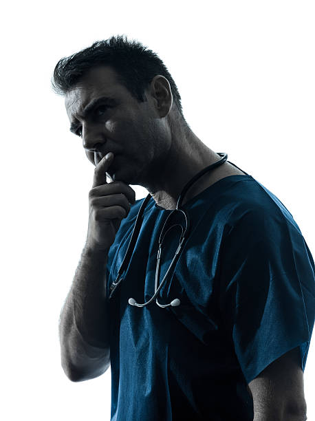 istock doctor man silhouette portrait thinking 158283053