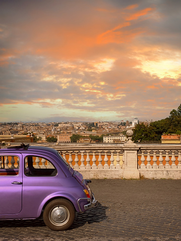 Beautiful view of Rome and classic vintage italian car