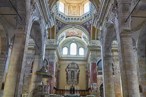 Cagliari, Italy - July 4, 2023: The nave and the main altar of the Cathedral of Saint Mary