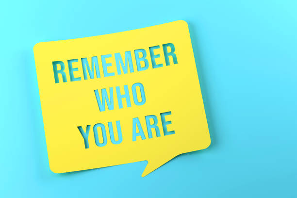 istock Remember Who You Are Written Yellow Speech Bubble On Blue Background 1582897259