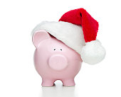 Piggy bank wearing Santa's hat