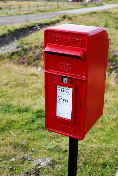 istock Typical English red mailbox in countryside 158293501