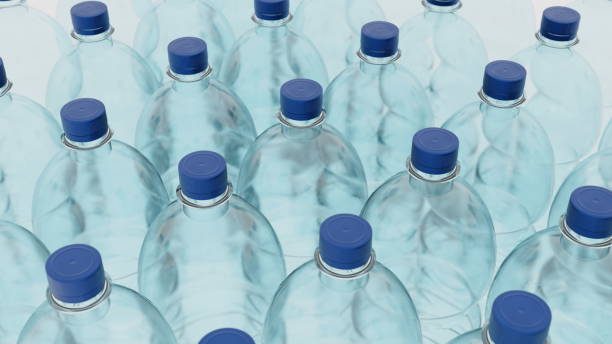 istock Empty plastic clean bottles for water with caps lids. Production of plastic bottles for water, isolate. 3d render 1582948900