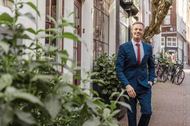 istock Handsome elegant single male 40s man in Amsterdam 1582968471