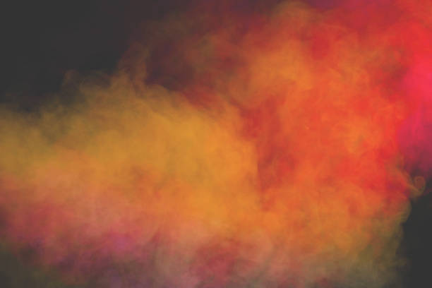 istock Blue and yellow steam on a black background. 1582973920