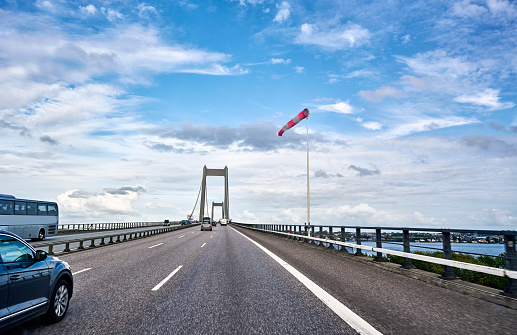 Multi lane highway over Funen. Windsock before entering the bridge telling about wind conditions