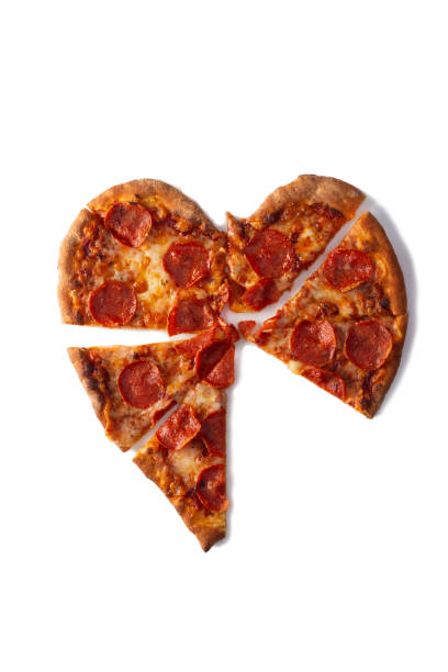 istock heart shaped pizza on white background for valentine's day 1583033806