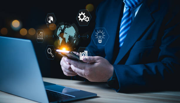 istock Businessman using mobile smartphone on global network connection on investor and customer with sale data exchange and development of business. Technology and digital marketing. Financial and banking. 1583036018
