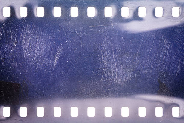 istock Dusty and grungy 35mm film texture or surface 1583047508
