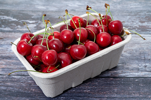 A basket of fresh cherries