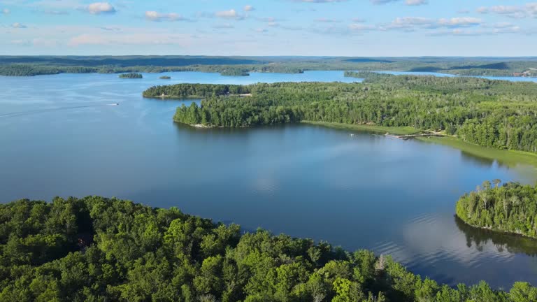 Flying over Pelican Lake and forest in Minnesota