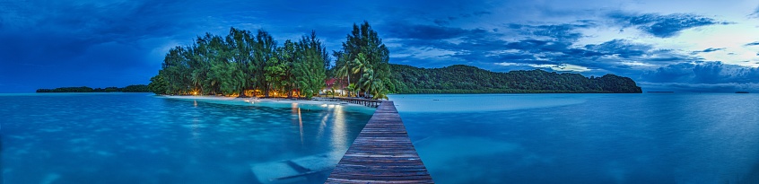 Panoramic view over Carp Island pier in Palau during sunset