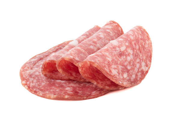 istock Sliced smoked sausage with fat on a white background. 1583074828