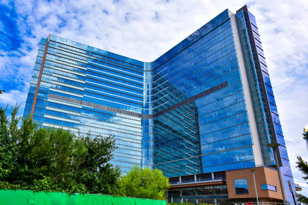 istock Modern High Rise and Cloudy Blue Sky 1583092444