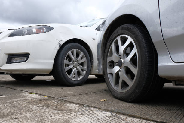istock Loss Adjuster Insurance Agent Inspecting Damaged Car. 1583116698