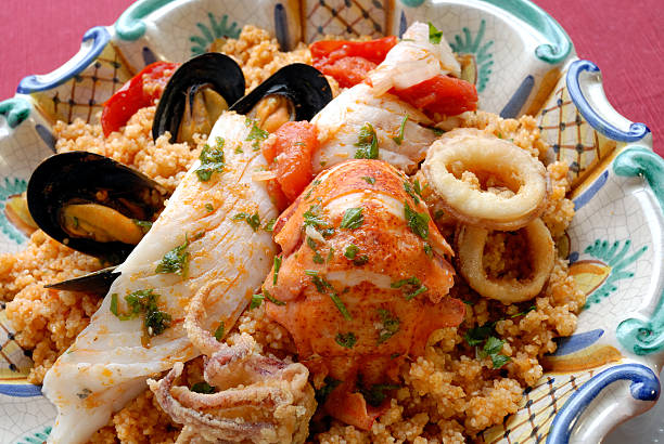 couscous avec poissons - trapani photos et images de collection