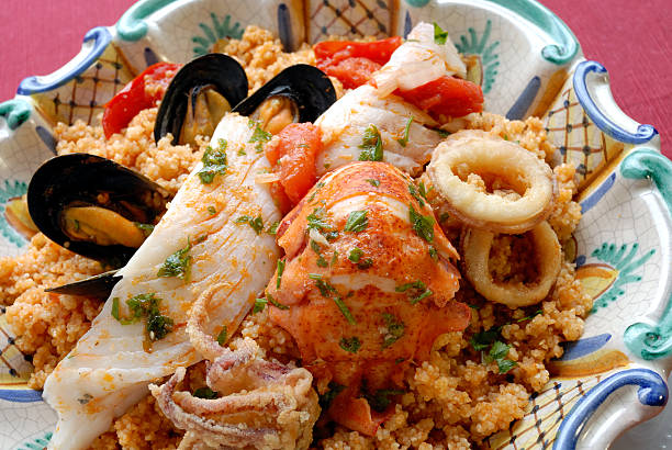 Couscous with fishes stock photo