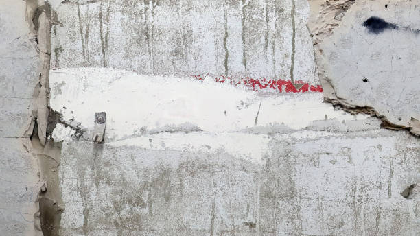 istock Close up Under construction, demolishing, showing peeling texture of existing plaster wall, abstract, arts, for background or backdrop for wallpaper or copy space, horizontal 1583136861