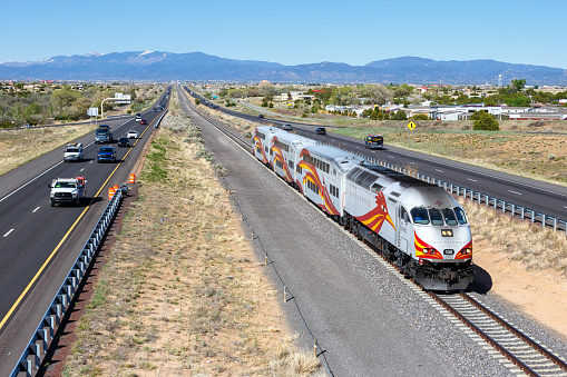 Santa Fe, United States - May 8, 2023: New Mexico Rail Runner Express commuter train railways near Santa Fe, United States.