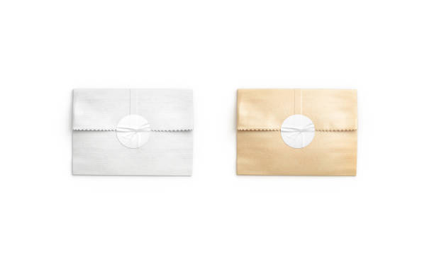 istock Blank white and craft rectangle paper bag with sticker mockup 1583162543