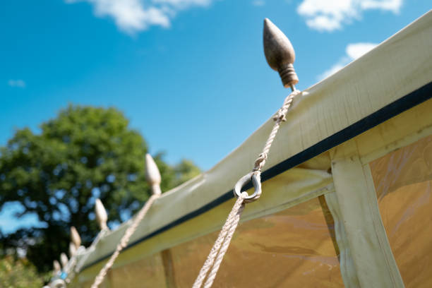 Shallow focus of large adjustable marquee guy ropes.